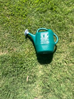 $10 New Plastic watering cans. Regularly $18