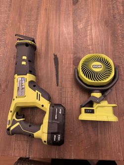Ryobi battery saw - New with one blade W/ Fan W/Battery Charger Including