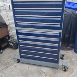 Tool box. It's a heavy duty cabinet converted in to a tool box 53"H34"W18"D. Key cylinder broken no key. Items not included.