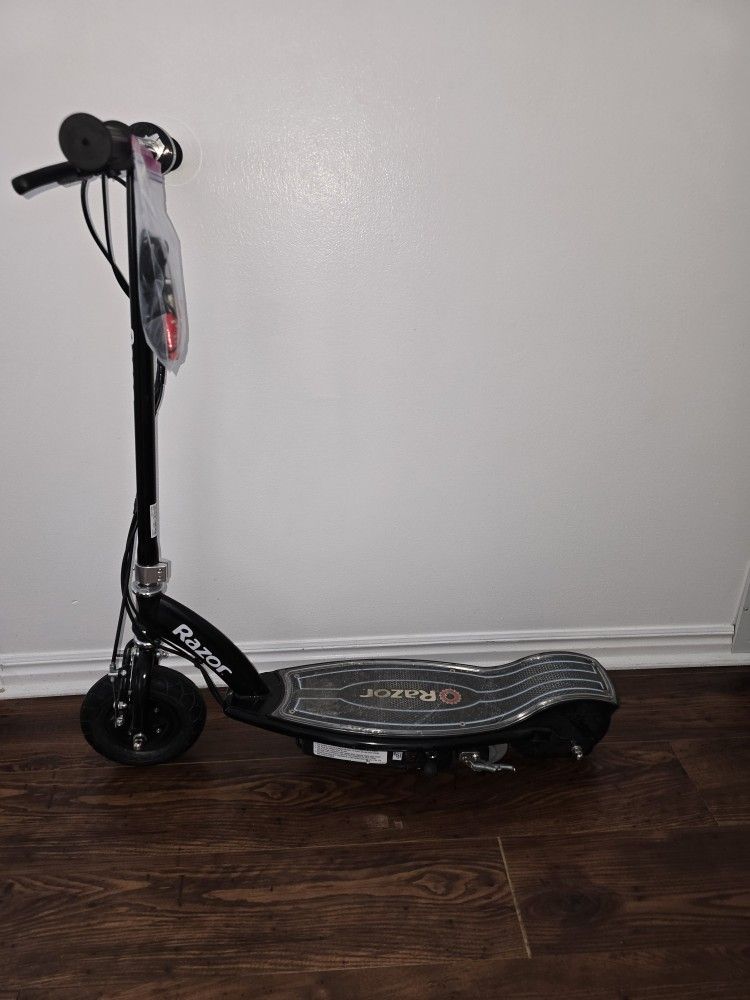 Razor E100 Glow Electric Scooter for Kids Age 8 and Up, LED Light-Up Deck