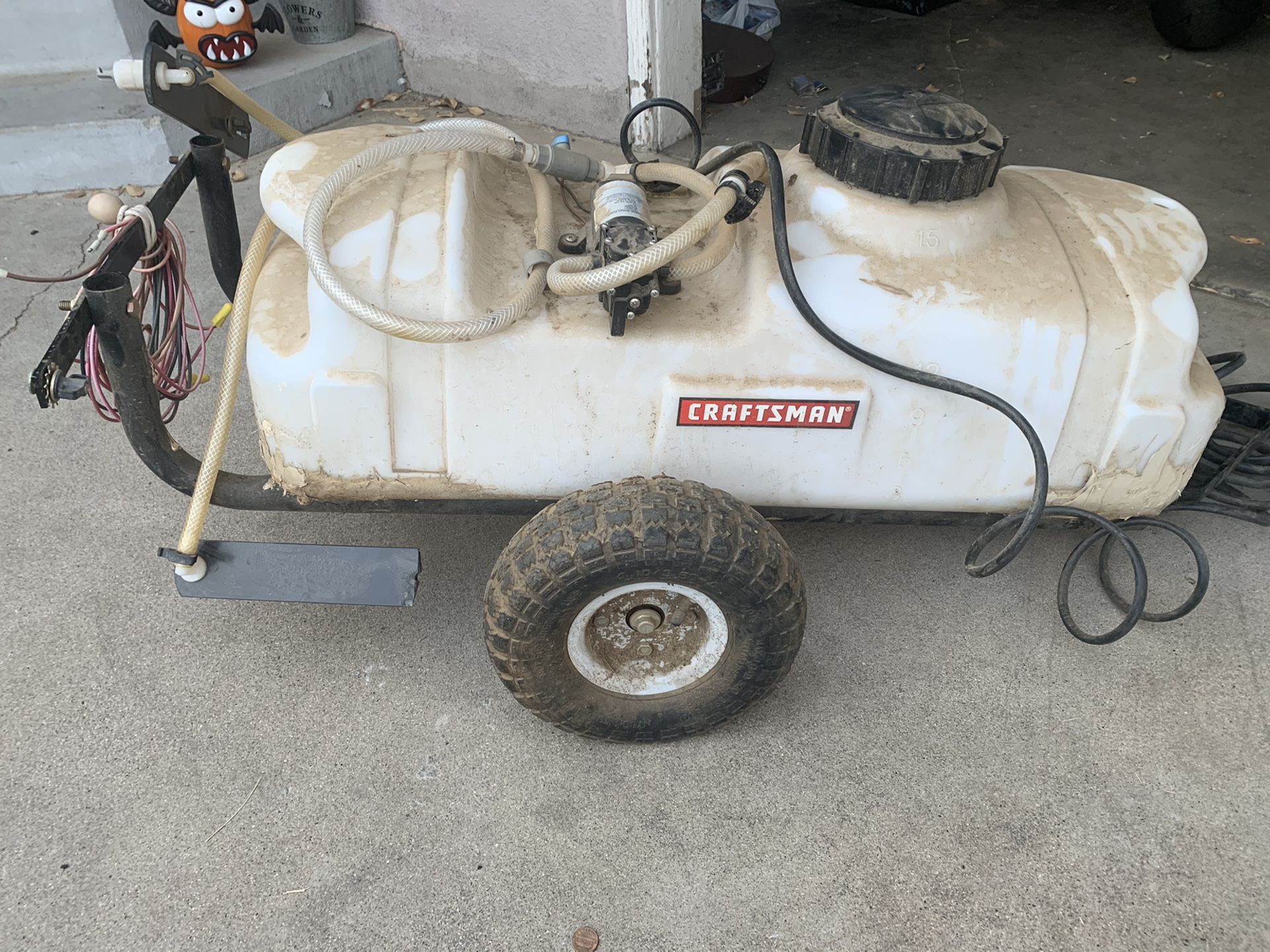 Craftmam tank sprayer with attachment.