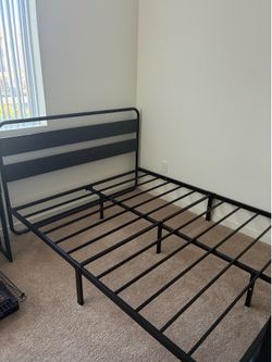 Bed frame, metal and wood. Black bed frame, Best offer or $125