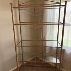 Beautiful sturdy stand with five shelves that are glass