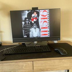 Dell computer + keyboard and mouse + mouse pad.