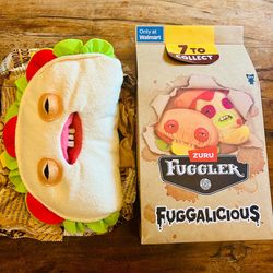 Taco Fuggler, officially named Wacko Taco, is a 9-inch plush from the Food Fuggalicious