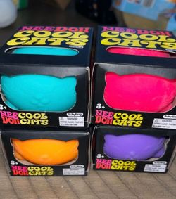 NeeDoh cool cats set of all 4 including rare orange  squishy toy