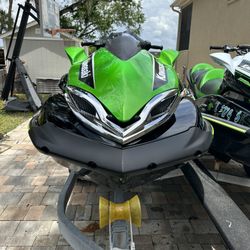2- 2018 Kawasaki jet skis with dual trailer and landing mats