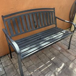 black steel slat-back garden bench,