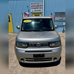 Aftermarket rims on a nissan cube