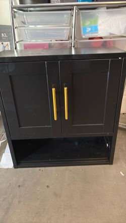 Black Cabinet with Gold Handles