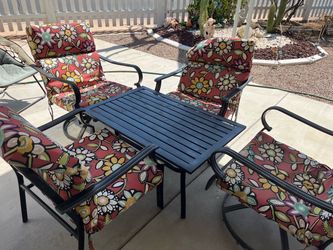 Outdoor patio 2 swivel chairs, 2 stationary chairs, include cushion, good condition, and table have rusty you can see on the picture
