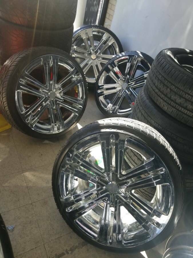 27 inch lexani chrome rims with Nitto run flats tires 8 lug bolt