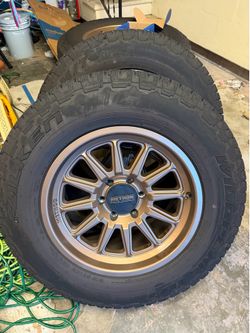 Set of 4 Method 323 Bronze wheels with Falken wild peak all season tires