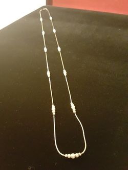 Silver necklace with pearl bead accents