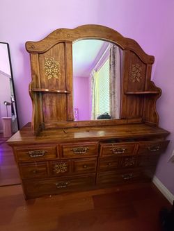 Dresser with mirror and headboard for bed