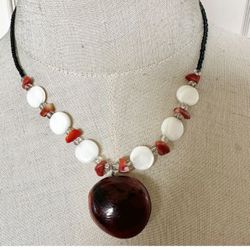 Tagua nut pendant  mother of pearl discs  coral and black pendant necklace