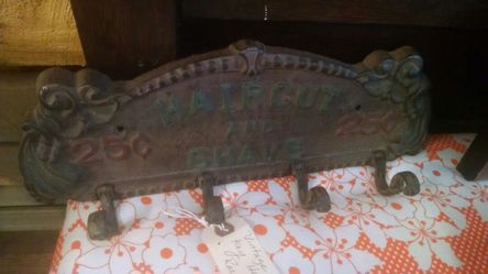 Cast iron wall hanging.