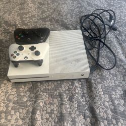 Xbox one S with 2 Xbox controllers and wires