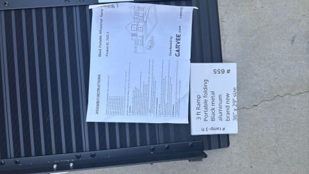 RAMP- size 36 inch long by 29 inch wide. Strong aluminum black color. Folds, portable, new 3 ft