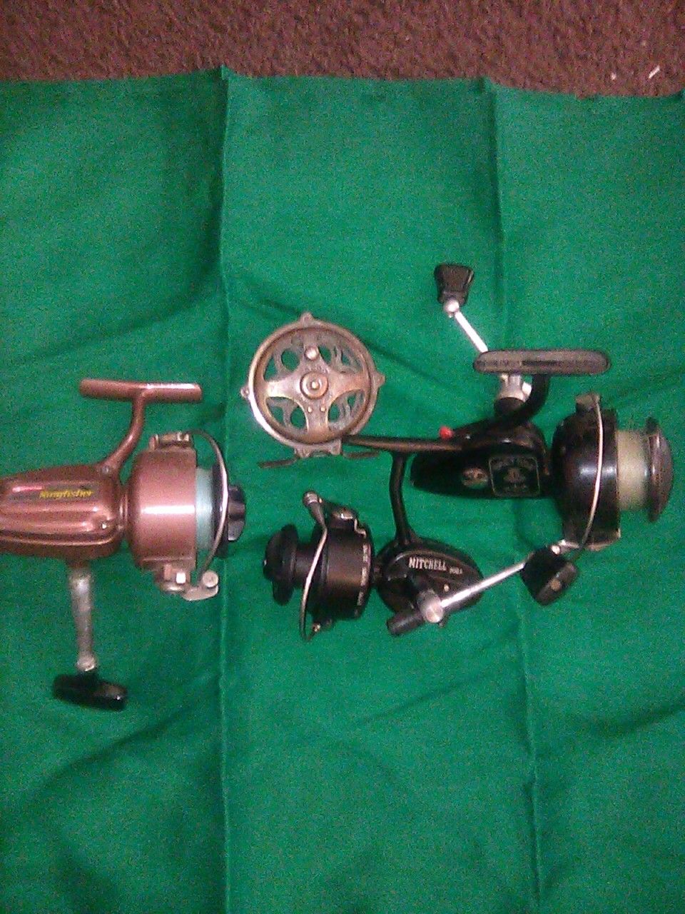 4 Vintage fishing reels Garcia, Benton ,Mitchell and kazoo asking 60.00