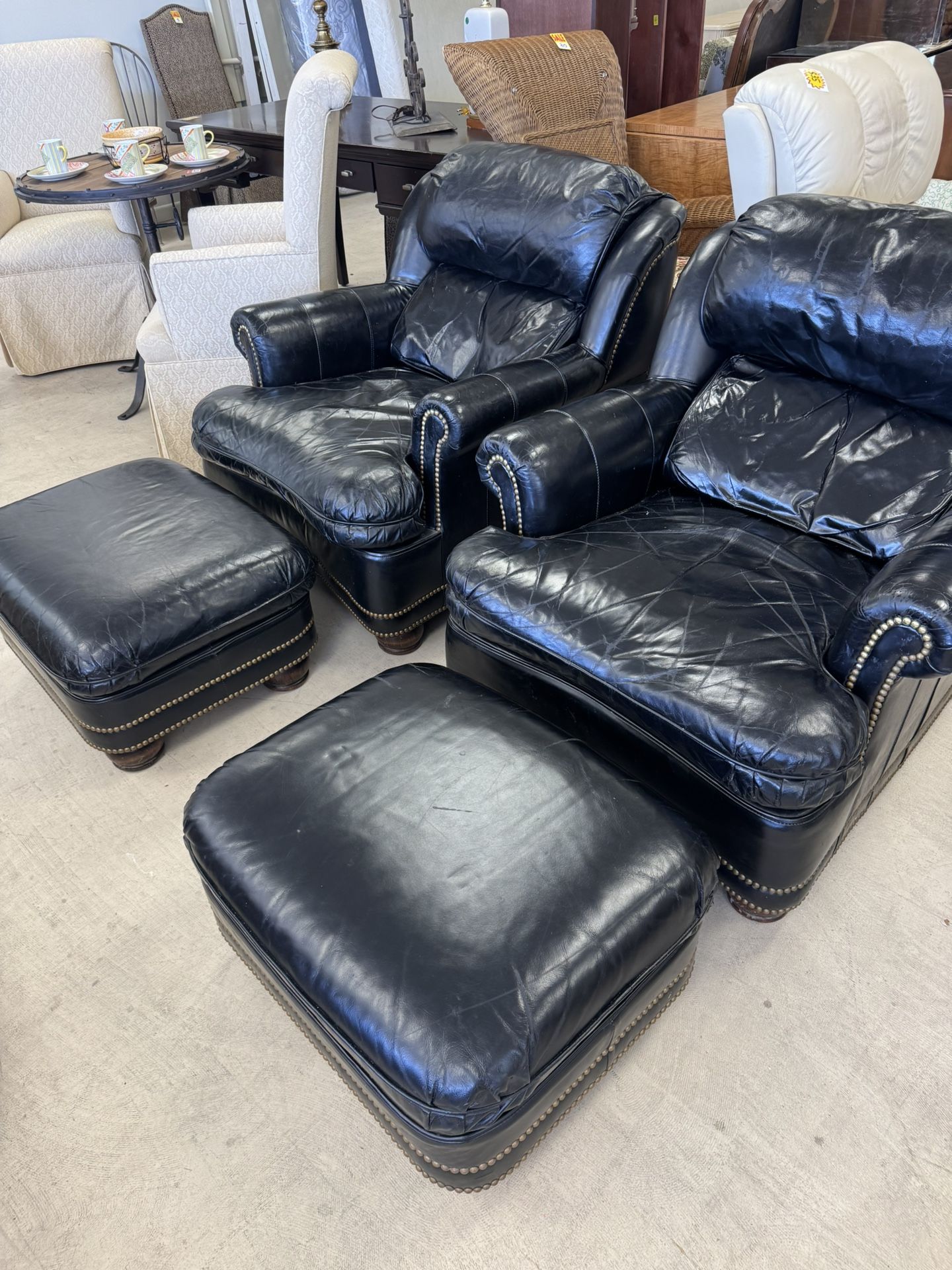 Pair of Hancock & Moore, Black Leather Upholstered Club Chairs and Ottomans