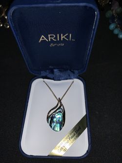 Ariki paua shell gold plated necklace.