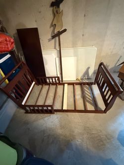 Wooden toddler bed with side rails