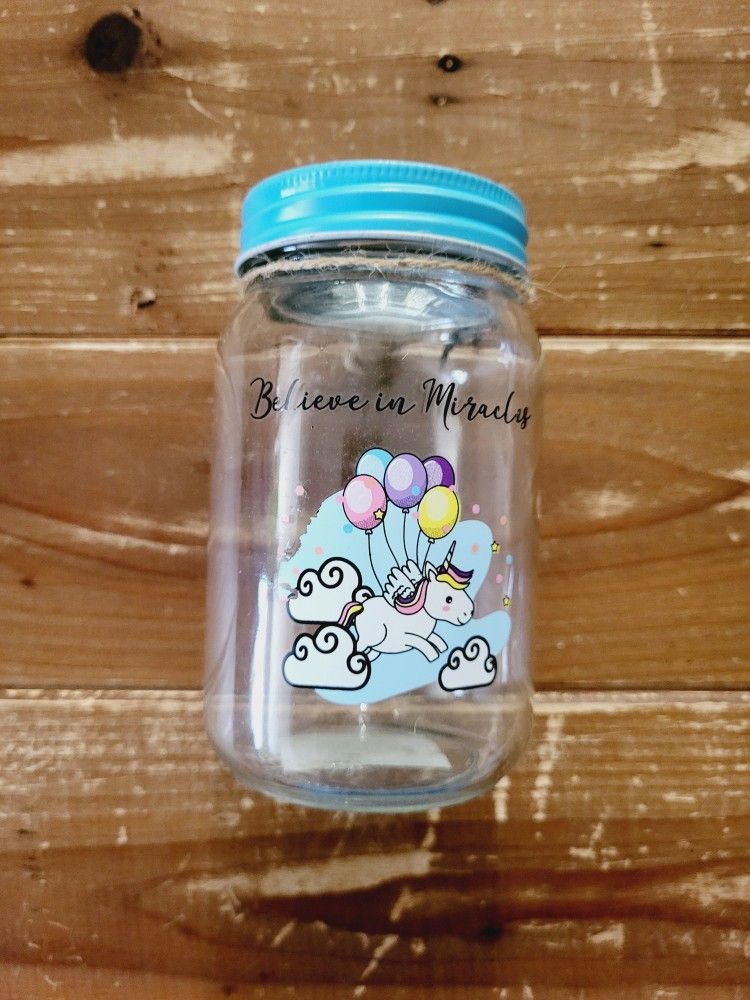 GLASS 'BELIEVE IN MIRACLES' UNICORN BANK W/WINGED CHARM **BRAND NEW**