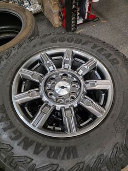 18" Chevy OEM rims Gunmetal/ Goodyear Territory MT tires