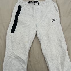 Nike Tech Fleece joggers in a grey color