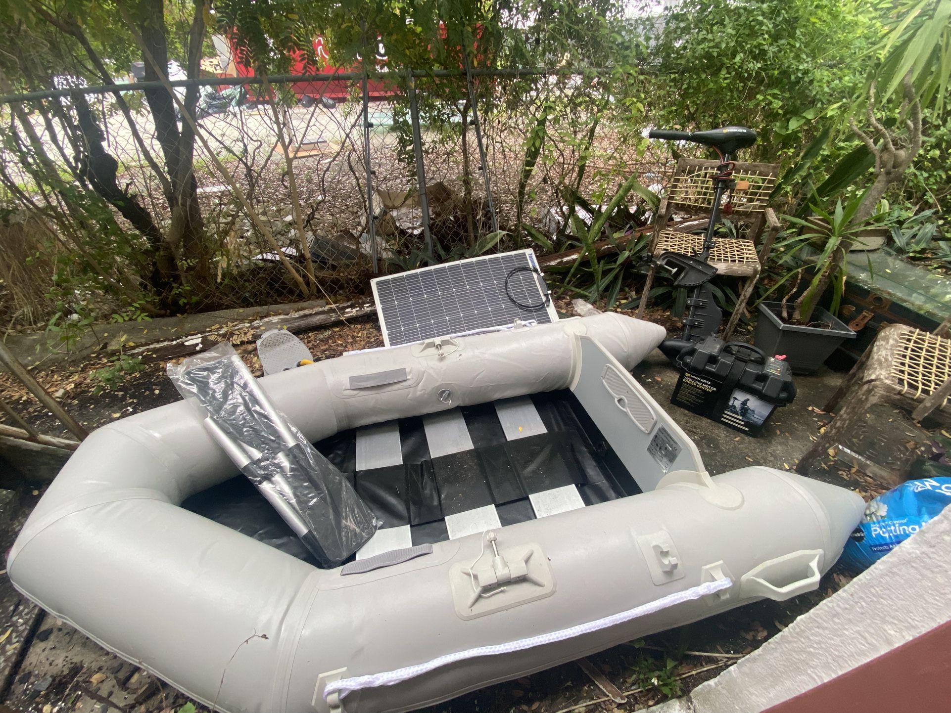 West Marine Inflatable Boat/dinghy 8ft W Battery, motor and solar Panel