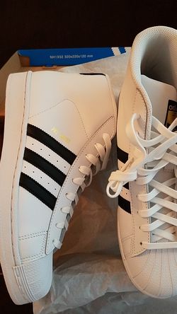PRO ADIDAS MODEL SIZE 9, BRAND NEW NEVER WORN $90.00