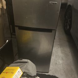 A magic chef fridge and freezer