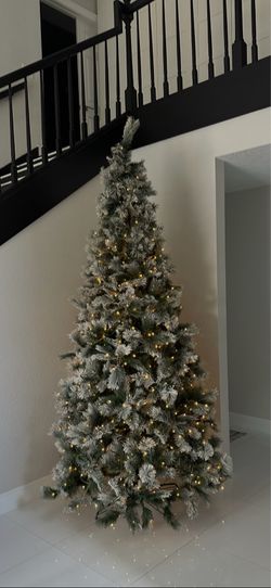 9 ft flocked Christmas Tree
