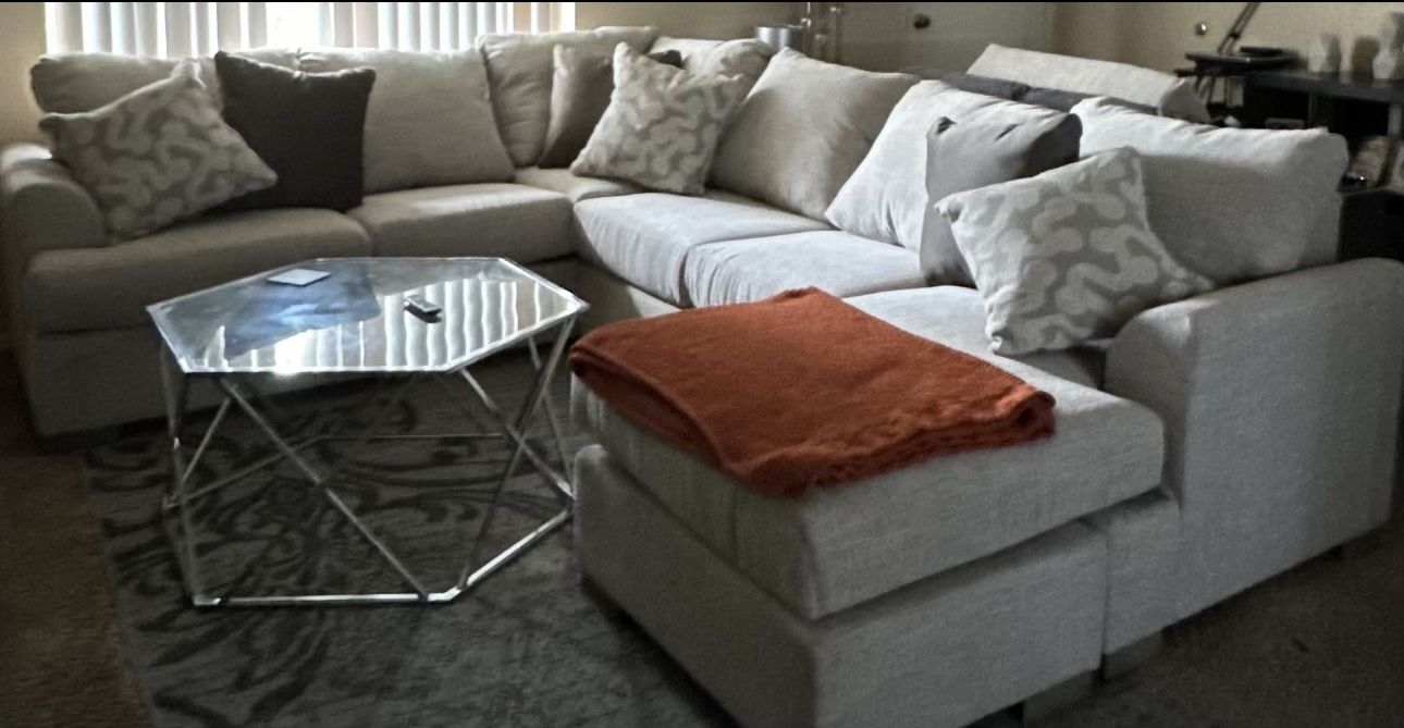 Couches with pillows and Coffee table