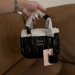 miumiu black bag 