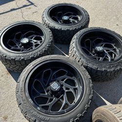 22x12 Black Rims & 33x12.50R22 Nitto Tires 22” Wheels Silverado Sierra