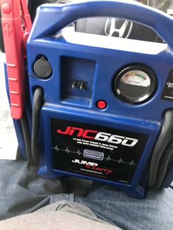 jump n carry 660 12 volt power supply & jump starter with auto charge technology
