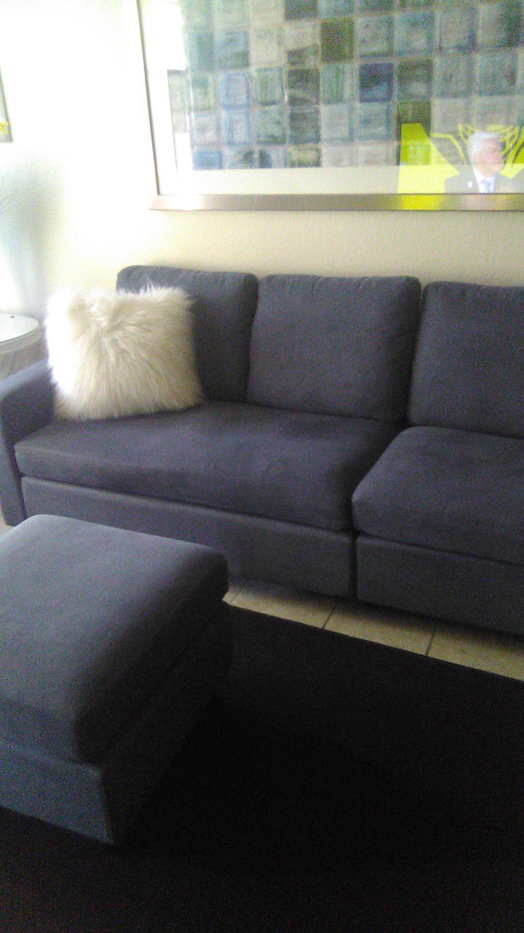 It's a sectional converts into a sofa Gray