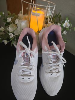 NIKE SIZE 8 , USED ONLY ONE TIME  .