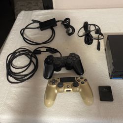 Playstation 2 Fat Console w/ 1 Controller and a couple videogames for it