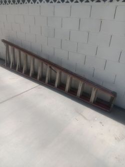 12ft fiberglass ladder use but in decent  condition