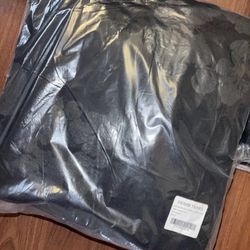 Black on Black denim tear