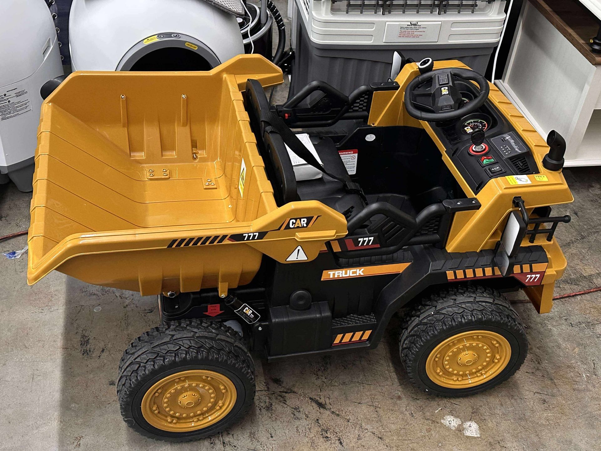 TOKTOO 12V Powered Ride on Dump Truck w/ Electric Dump Bed, 19-inch Wide Seat Ride on Car for Kids-Ochre Yellow