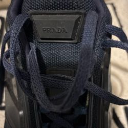 Prada… Cloudbust Thunder… Blue.. 10