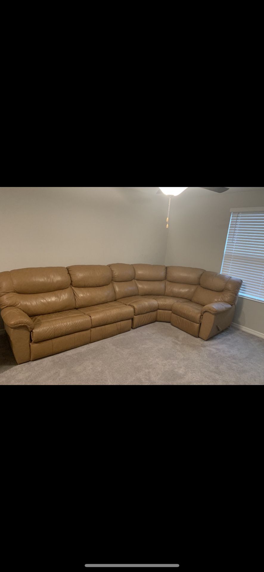 Leather sectional W/ Recliner