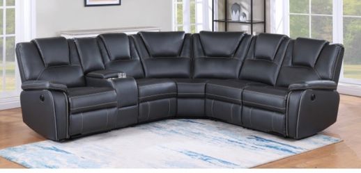 BLACK FAUX LEATHER POWER MOTION RECLINING SECTIONAL. FINANCING AVAILABLE
