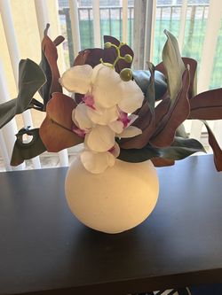 Artificial plant and vase