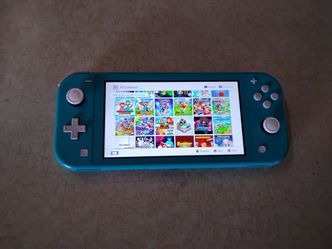 NINTENDO SWITCH LITE MOD with 7500 Games Installed
