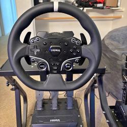Moza r5 steering, wheel pedals and clutch comes with a sequential shifter and the cockpit seat